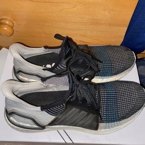 Ultra boost 19 , core black and shock cyan